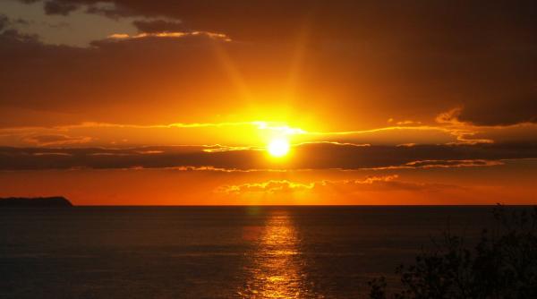 apus de soare vazut din spa iu foto