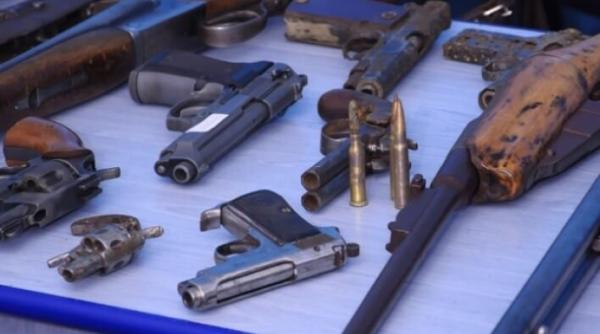 arsenal descoperit in casa criminalului din dolj