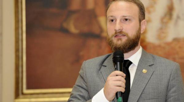 andrei tinu func ie importanta rang de secretar de stat