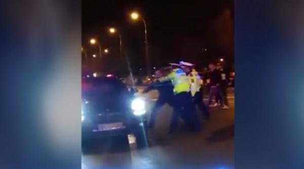 ofer blocat in trafic cu ma ini de poli ie i focuri de arma