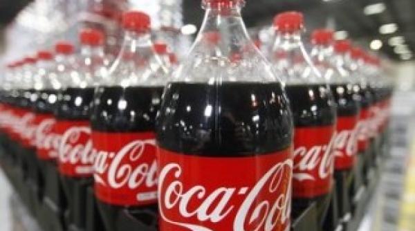 chipul miliardarului warren buffet pe cutiile de coca cola