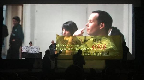 proiec ie de film intrerupta de cantece religioase video foto mesaj catre soros