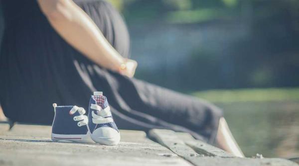 o noua victima a epidemiei de gripa minora insarcinata