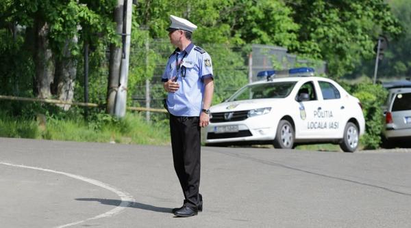 focuri de arma dupa ce un politist a fost luat pe capota unei masini