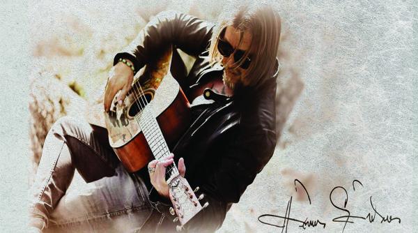 eveniment editorial si muzical in organizarea bibliotecii judetene lucian blaga alba invitat cantautorul adrian sarmasan