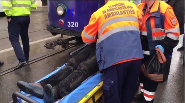 femeie tarata de tramvai