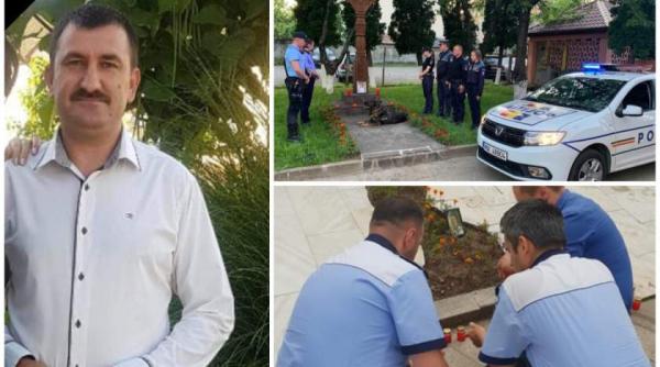 sute de politisti din toata tara au aprins lumanari pentru agentul impuscat in timis