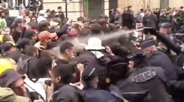 proteste violente la paris de ziua frantei 2019 politia da cu gaze lacrimogene