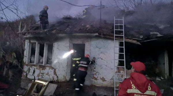 casa cuprinsa de flacari dupa ce a cazut jarul din soba