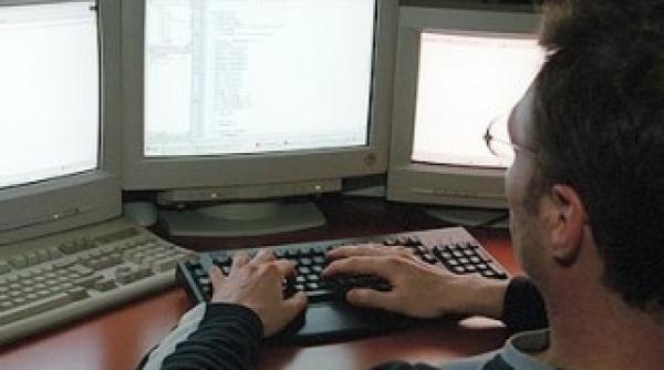 la cati ani de inchisoare au fost condamnati doi hackeri romani in sua