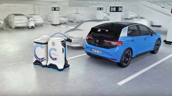 dilema vehiculelor electrice rezolvata de volkswagen robotul autonom care incarca masinile din parcari