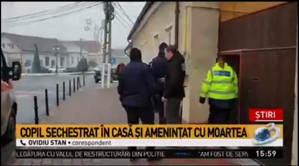 copil sechestrat in casa si amenintat cu moartea la ghimbav