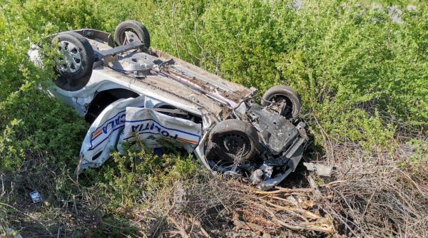 masina de politie lovita de tren un mort si trei raniti