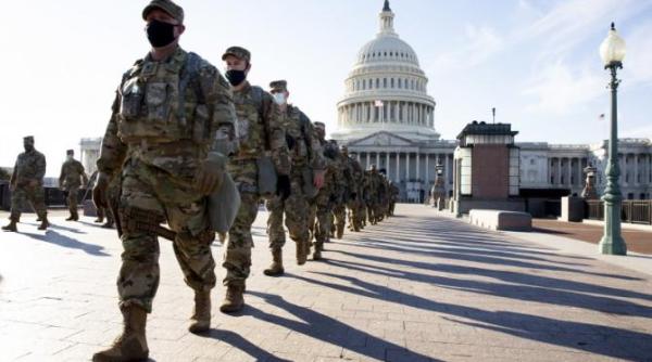 investire joe biden sute de membri ai garzii nationale care au asigurat securitatea au covid