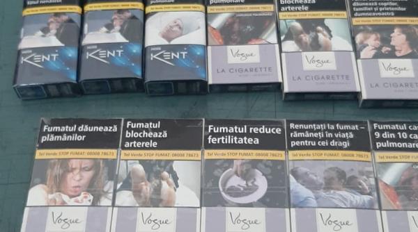 pachete de tigari umplute cu cartoane  vandute pe sub mana la obor