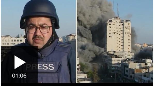 confruntarile continua in gaza o cladire a fost bombardata si s a prabusit fix in timpul transmisiunii unui reporter bbc video