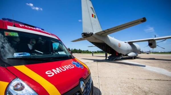 un barbat cu arsuri si un copil cu diferite afectiuni  transportati cu un avion militar la spitale din belgia
