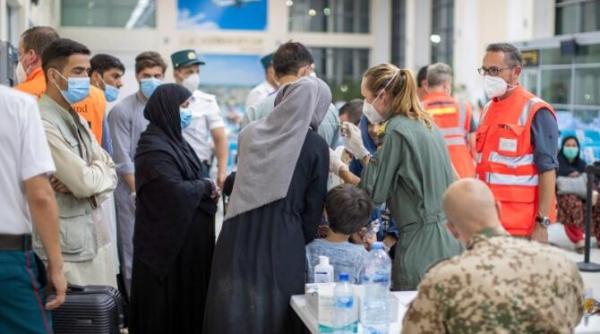 talibanii dau asigurari ca femeile vor putea studia la universitate