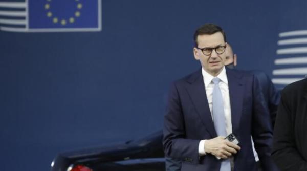 premierul din polonia acuza uniunea europeana ca atinteste un pistol spre tampla tarii sale