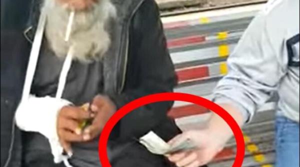 politisti locali din cluj napoca i au rupt mana unui cersetor apoi l au mituit cu 500 de lei ca sa taca video