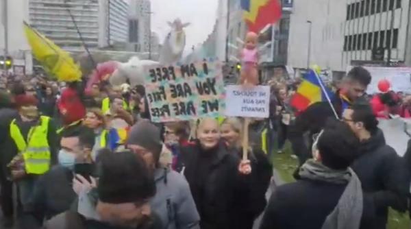 drapelul romaniei la protestul din bruxelles chirieac ironic sars cov 2 va deveni mai putin letal impresionat fiind de acest lucru