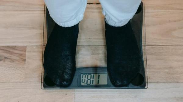 legatura dintre pierderea in greutate si protectia impotriva covid 19