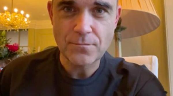 robbie williams sustine ca un asasin a fost angajat ca sa l omoare