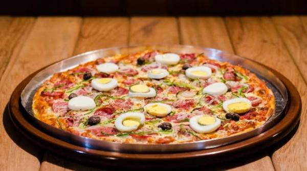 pizza ziua internationala secretul pentru pizza perfecta nu sta in modul de coacere nici in topping uri ci in aluat