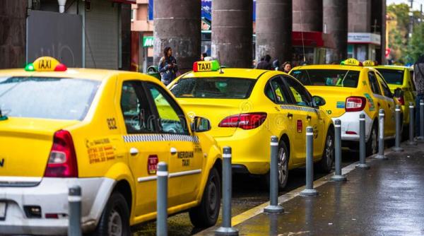 iohannis a semnat decretul privind transportul in regim de taxi