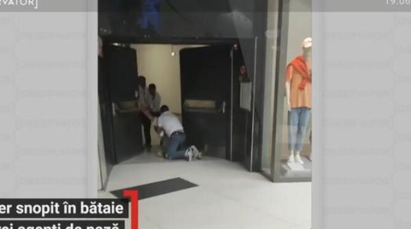 paznicii dintr un mall din bucuresti au calcat in picioare un tanar livrator pentru ca si a lasat bicicleta neregulamentar ce a facut dom le a furat
