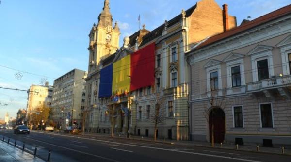 cum explica tanarul din cluj napoca gestul de a incendia intrarea in primaria condusa de emil boc