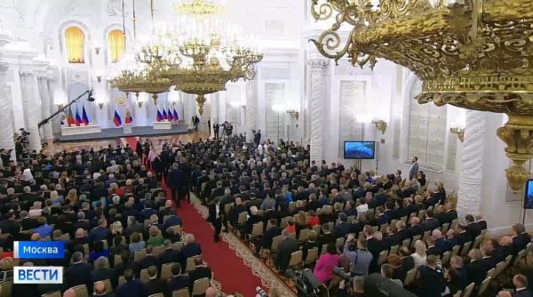 dovada ca elita rusiei statea ca la inmormantare la ceremonia lui putin in care a semnat anexarea regiunilor din ucraina galerie foto