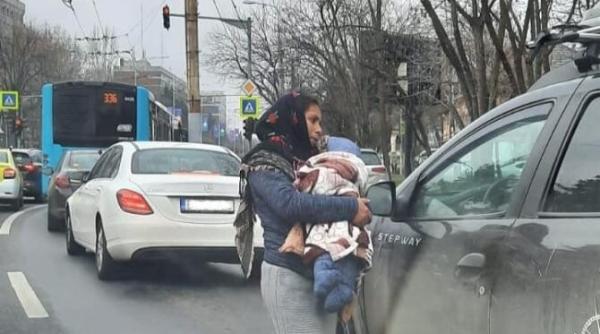 o noua escrocherie in bucuresti un banut pentru lapte praf ce ascunde cersetoria cu bebelusi in brate o adevarata retea foto