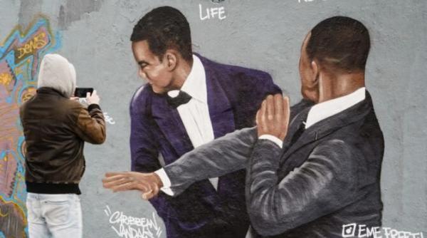 chris rock reactioneaza la un an dupa ce a fost plesnit de will smith