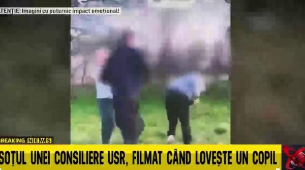 sotul unei consiliere usr filmat in timp ce loveste puternic un copil