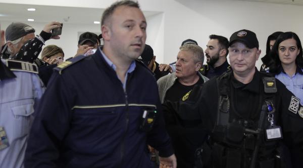 dorin lazar maior a fost adus in tara sub escorta politiei