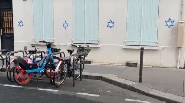 un cuplu din republica moldova arestat in franta pentru antisemitism cei doi au desenat steaua lui david pe zidurile din paris