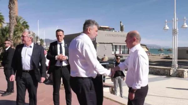 marcel ciolacu pranz cu olaf scholz a friend in need is a friend indeed video in articol