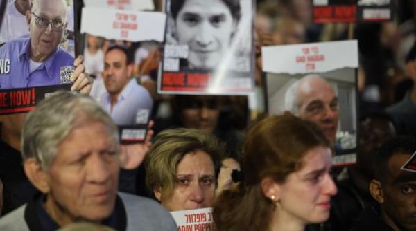 israelienii indeamna guvernul sa actioneze acum in privinta ostaticilor nu ii vrem inapoi in saci