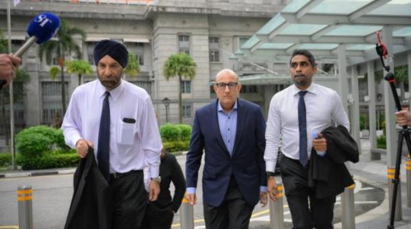 ministrul transporturilor din singapore are 27 de capete de acuzare intr o ancheta pentru coruptie ultimul caz de coruptie in care a fost implicat un ministru a fost in 1986 reuters