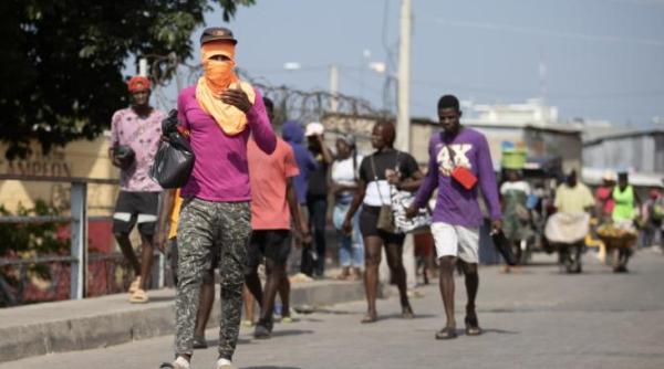 seful bandelor din haiti va lua parte la negocieri daca va fi invitat dar avertizeaza ca fortele straine vor fi tratate ca invadatori