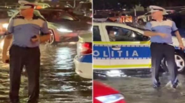 cine este politistul care si a facut datoria pe cod rosu in bucuresti cu picioarele in apa pana la glezne pe o ploaie torentiala grindina