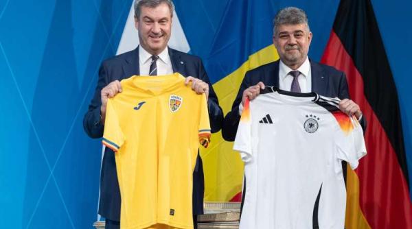 ciolacu si premierul soder sustinere reciproca pentru echipele de fotbal la euro 2024 cei doi au facut schimb de tricouri ale nationalelor
