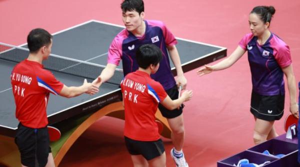 jucatorii de tenis de masa nord coreeni ar putea fi pedepsiti pentru selfie ul de pe podiumul olimpic cu rivalii din sud