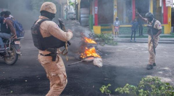 bandele haitiene recruteaza copii infometati pentru a lupta impotriva fortelor de securitate constata un grup pentru drepturile omului