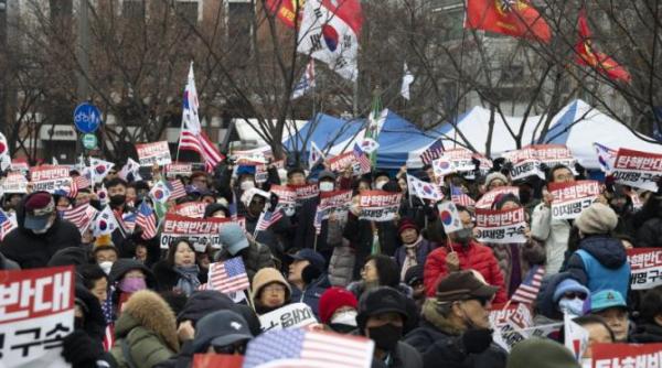 criza politica in coreea de sud seful securitatii presedintelui destituit avertizeaza impotriva unei arestari violente