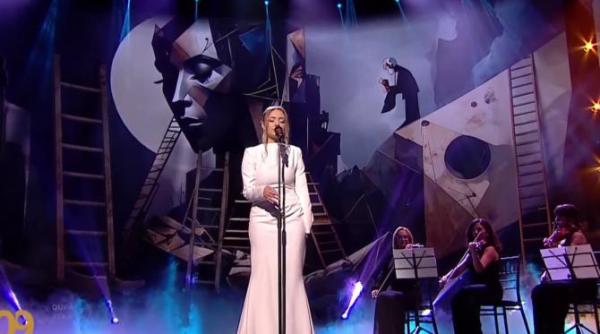 alexia tudose a facut o tara intreaga sa planga cu glasul ei duios andra pentru mine esti ca o raza de soare care vine dupa multa ploaie