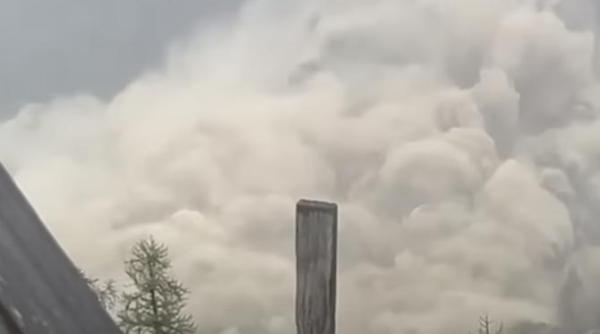 sat ingropat in elvetia dupa o avalansa de noroi gheata si roci