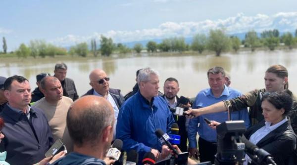 inundatii premierul interimar catalin predoiu anunta ca urmeaza reparatii evaluari si ajutor concret pentru sinistrati