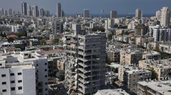 iran lanseaza un nou atac asupra israelului in timp ce donald trump spune ca vom avea pace in curand update imaginile dezastrului galerie foto